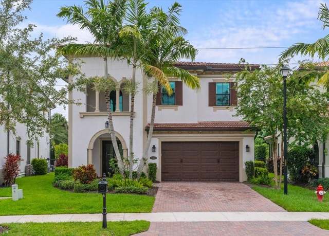 Property at 9350 E Meridian Dr E, Parkland, FL 33076, 5 beds, 3.5 baths