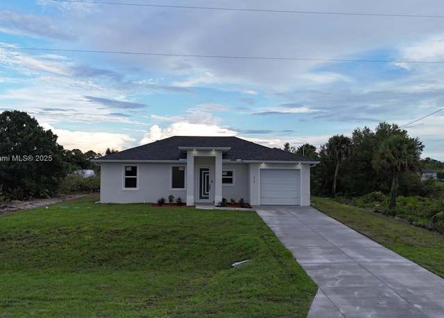 Property at 1073 Barnett St E, Lehigh Acres, FL 33974, 3 beds, 2 baths