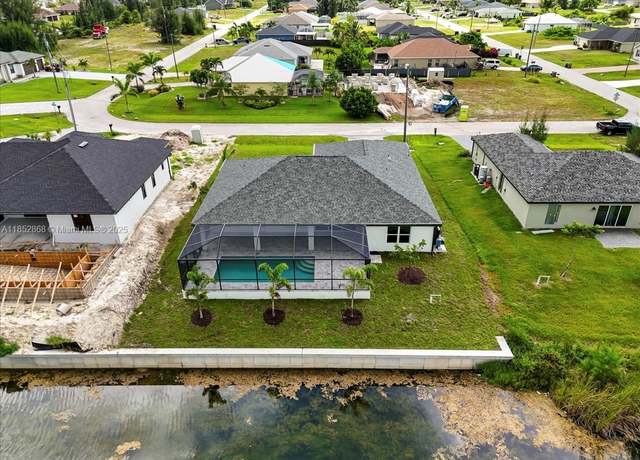 Property at 2107 NW 20th Ter, Cape Coral, FL 33993, 4 beds, 3 baths
