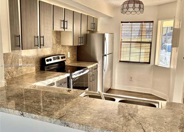 Property at 2113 Champions #2113, North Lauderdale, FL 33068, 2 beds, 2.5 baths