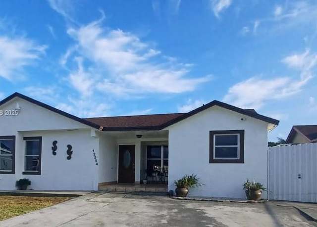 Property at 12554 SW 211th Ter, Miami, FL 33177, 3 beds, 2 baths