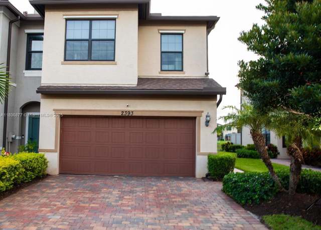 Property at 2393 Post St, Palm Springs, FL 33406, 3 beds, 2.5 baths