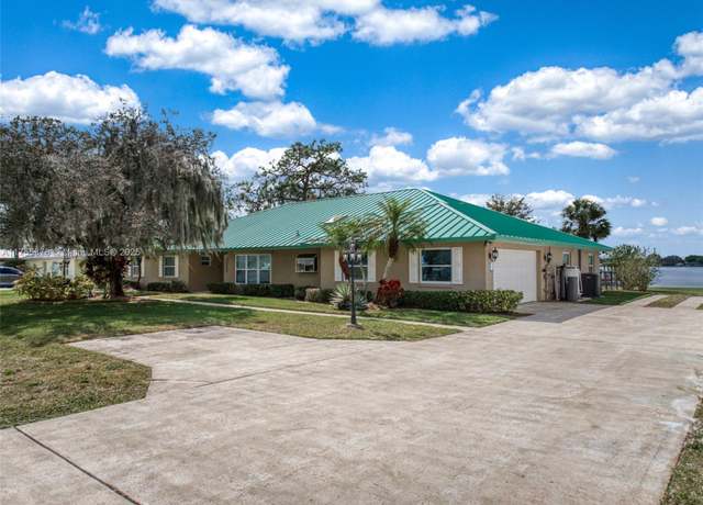 Property at 922 Lake Dr E, Lake Placid, FL 33852, 5 beds, 3 baths
