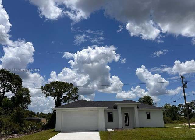 Property at 938 Grant Blvd, Lehigh Acres, FL 33974, 3 beds, 2.5 baths