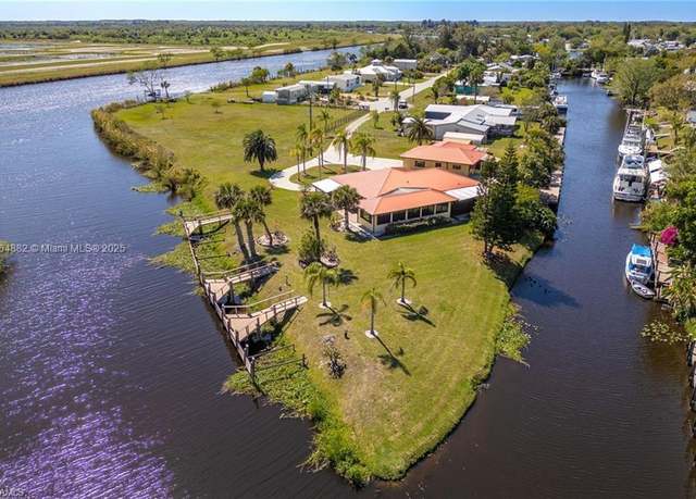 Property at 1107 E Anchor Ln, Moore Haven, FL 33471, 3 beds, 2 baths