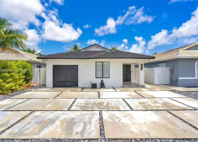 Property at 9799 NW 128th Ln, Hialeah Gardens, FL 33018, 3 beds, 2 baths