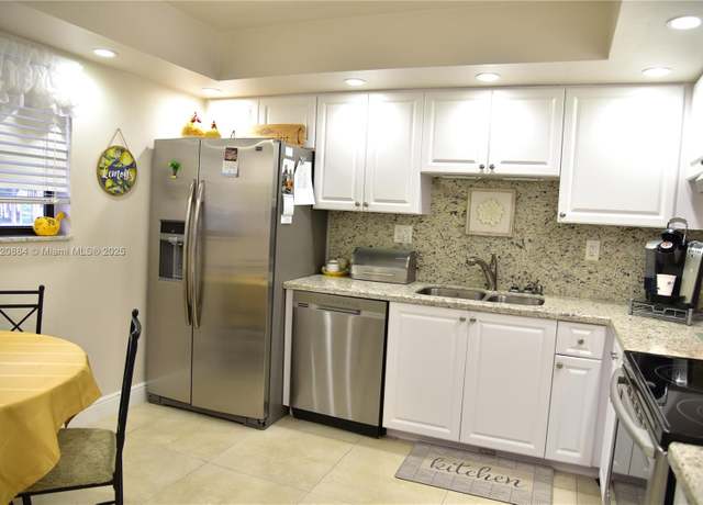 Property at 4960 E Sabal Palm Blvd #211, Tamarac, FL 33319, 2 beds, 2 baths