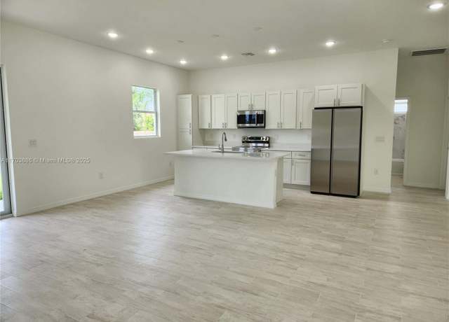Property at 4116 5 St, Lehigh Acres, FL 33976, 3 beds, 2 baths