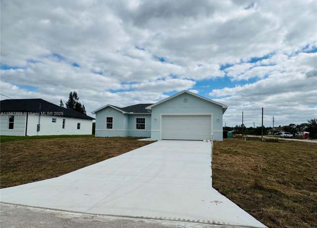 Property at 426 Mercedes Ct, Lehigh Acres, FL 33972, 4 beds, 2 baths