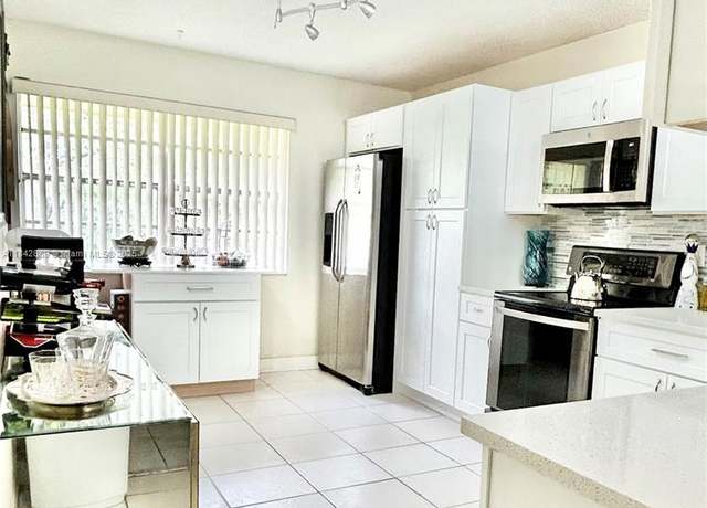 Property at 8791 Holly Ct #202, Tamarac, FL 33321, 3 beds, 2 baths