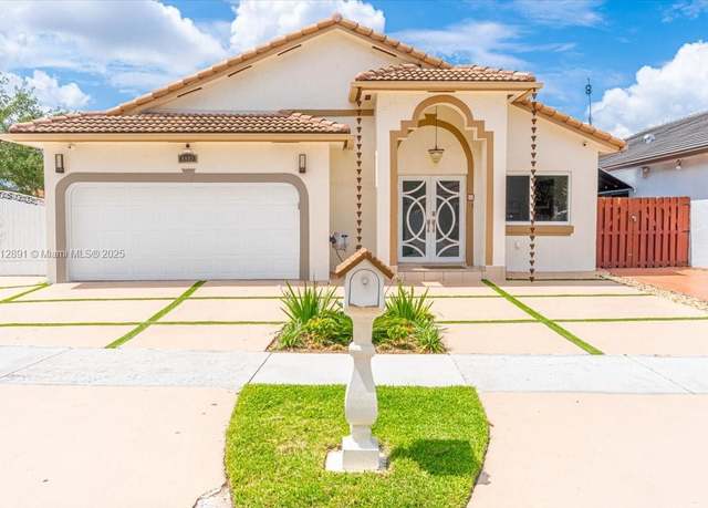Property at 8902 NW 148th St, Miami Lakes, FL 33018, 3 beds, 2 baths