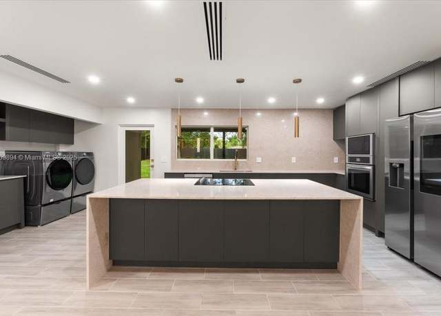 Property at 11505 NE 11th Pl, Biscayne Park, FL 33161, 5 beds, 3.5 baths