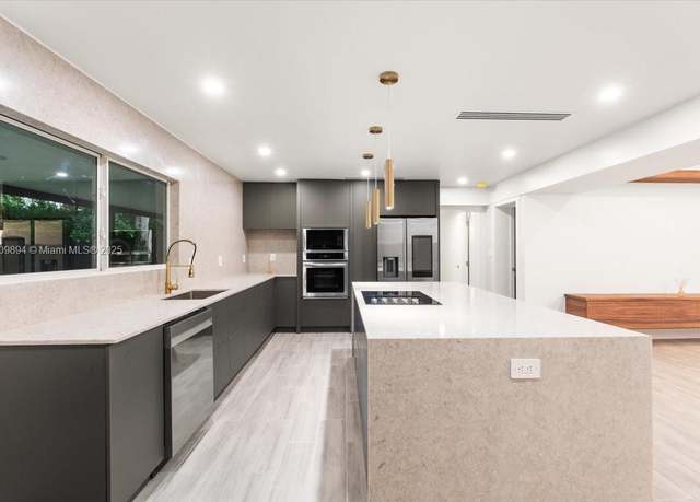 Property at 11505 NE 11th Pl, Biscayne Park, FL 33161, 5 beds, 3.5 baths