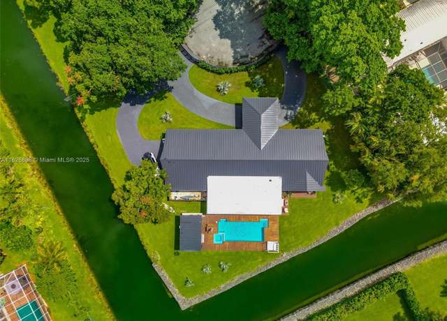 Property at 7000 SW 125th St, Pinecrest, FL 33156, 5 beds, 4.5 baths