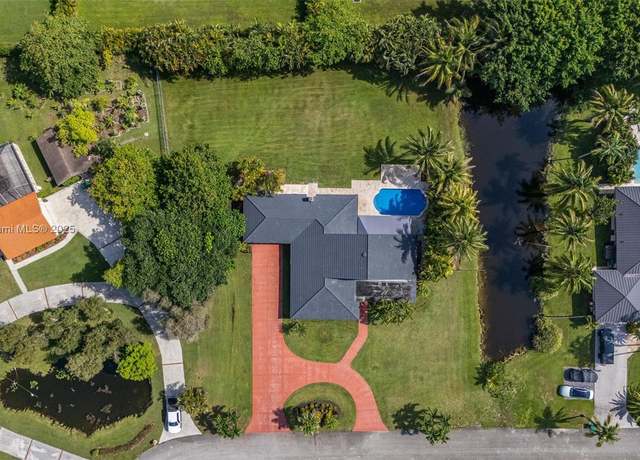 Property at 11965 SW 15th Ct, Davie, FL 33325, 4 beds, 3 baths