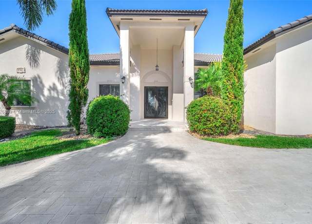 Property at 9741 NW 130th St, Hialeah Gardens, FL 33018, 5 beds, 4 baths