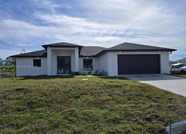 Property at 1605 W 11th St, Lehigh Acres, FL 33971, 4 beds, 2 baths