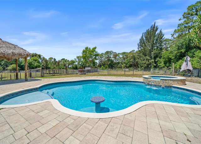 Property at 15696 Ferris Pl, Loxahatchee, FL 33470, 5 beds, 3 baths