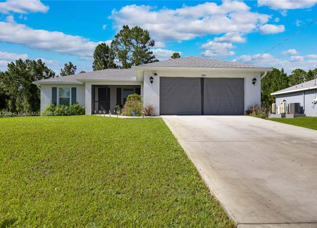 Property at 1246 County St E, Lehigh Acres, FL 33974, 3 beds, 2 baths