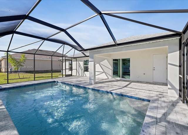 Property at 624 NW 15th St, Cape Coral, FL 33993, 4 beds, 3 baths
