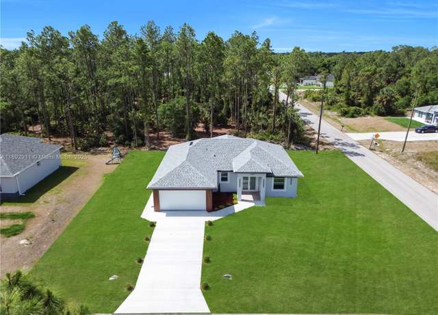 Property at 1107 W 13th St, Lehigh Acres, FL 33972, 3 beds, 2 baths