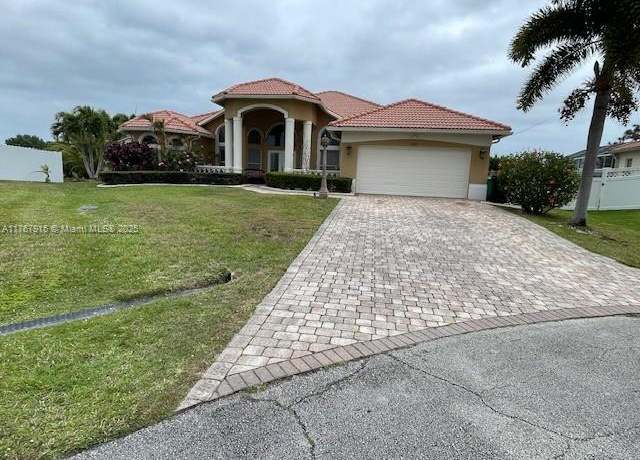Property at 5909 NW Bayou Ct, Port St. Lucie, FL 34986, 3 beds, 2 baths