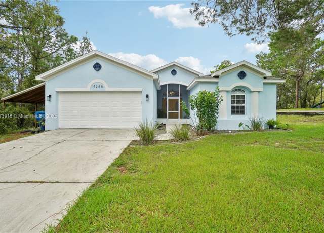 Property at 11288 Flower Ave, Spring Hill, FL 34613, 4 beds, 2 baths