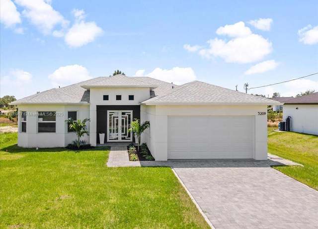 Property at 3209 29th St W, Lehigh Acres, FL 33971, 4 beds, 2 baths