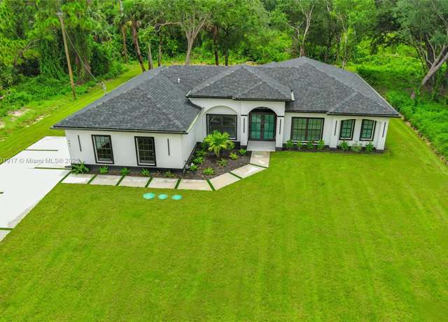 Property at 407 Washington Ave, Lehigh Acres, FL 33972, 4 beds, 2 baths