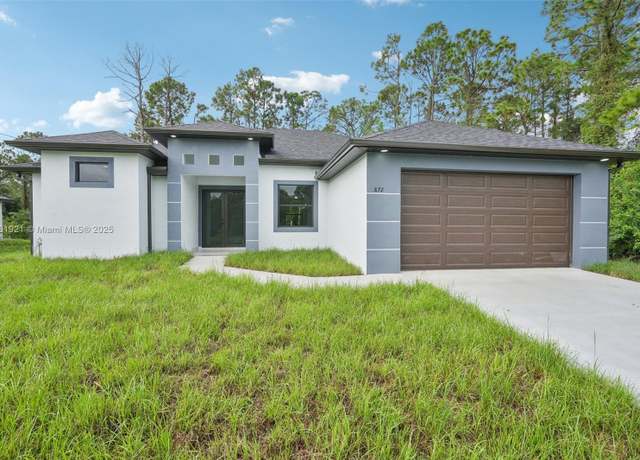 Property at 872 Spaulding St E, Lehigh Acres, FL 33974, 3 beds, 3 baths