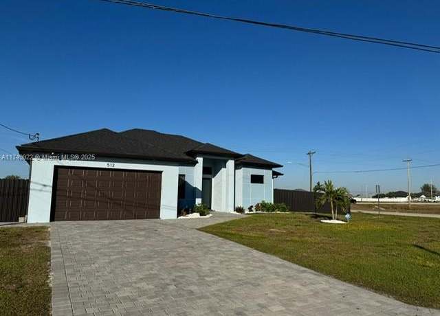 Property at 512 NE Juanita Pl, Cape Coral, FL 33909, 4 beds, 3 baths