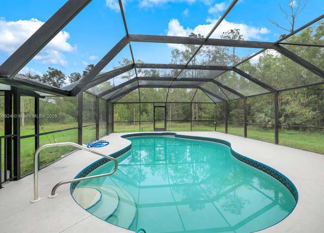 Property at 3973 4th Ave SE, Naples, FL 34117, 4 beds, 3 baths