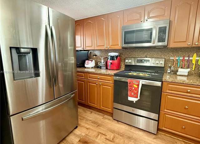 Property at 9917 W Okeechobee Rd Unit 3-201, Hialeah Gardens, FL 33016, 3 beds, 2 baths