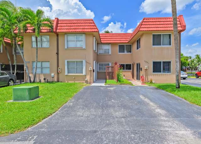 Property at 7023 NW 169th St #7023, Hialeah, FL 33015, 4 beds, 2.5 baths