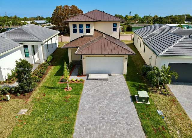 Property at 312 SE Via Sangro, Port St. Lucie, FL 34952, 4 beds, 2.5 baths