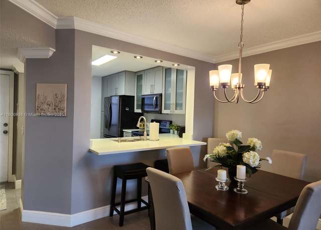 Property at 2455 N Nob Hill Rd #404, Sunrise, FL 33322, 2 beds, 2 baths