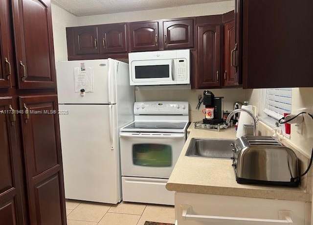 Property at 1280 NW 43rd Ter #202, Lauderhill, FL 33313, 2 beds, 2 baths