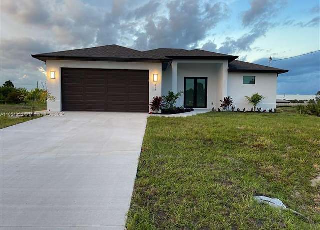 Property at 817 Newell St E, Lehigh Acres, FL 33974, 3 beds, 2 baths