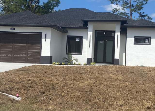 Property at 3806 3806 E 18th St, Lehigh Acres, FL 33972, 4 beds, 2.5 baths