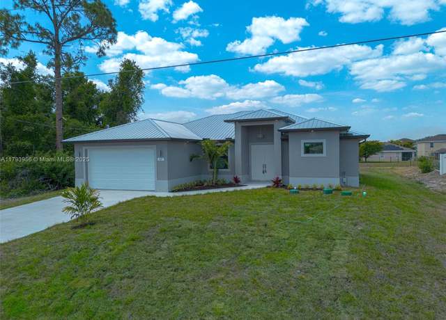 Property at 417 Paddock St, Lehigh Acres, FL 33974, 3 beds, 2 baths