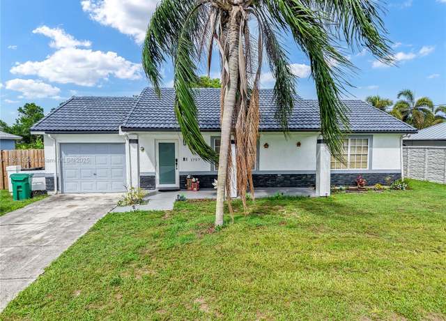 Property at 1797 SW Hampshire Ln, Port St. Lucie, FL 34953, 3 beds, 2 baths