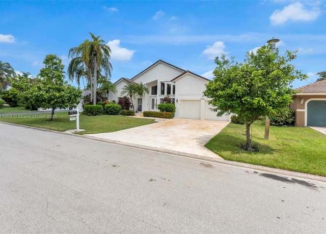 Property at 9935 NW 49th Pl, Coral Springs, FL 33076, 5 beds, 3 baths