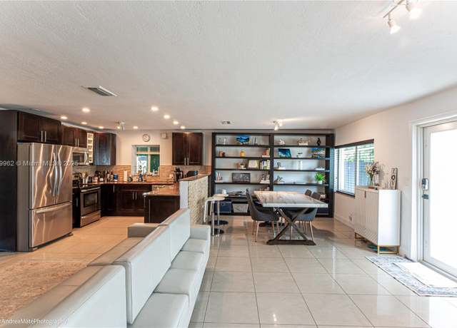 Property at 5901 NE 4th Ave, Oakland Park, FL 33334, 4 beds, 3 baths