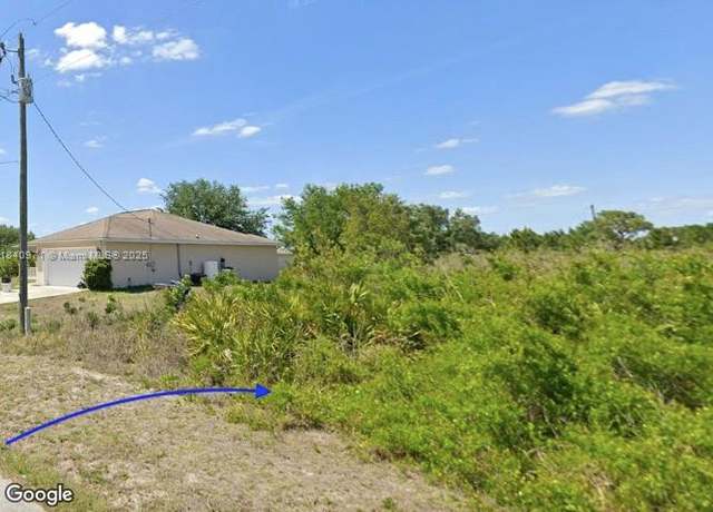 Property at 2512 56th St W, Lehigh Acres, FL 33971