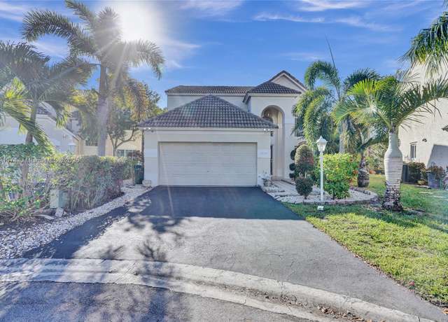 Property at 7698 Hibiscus Ln, Coral Springs, FL 33065, 3 beds, 2.5 baths