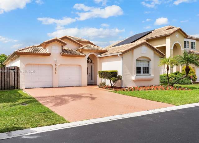 Property at 9764 NW 32nd St, Doral, FL 33172, 4 beds, 3 baths