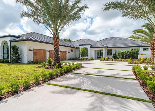 Property at 1639 Breakers West Blvd, West Palm Beach, FL 33411, 4 beds, 4.5 baths
