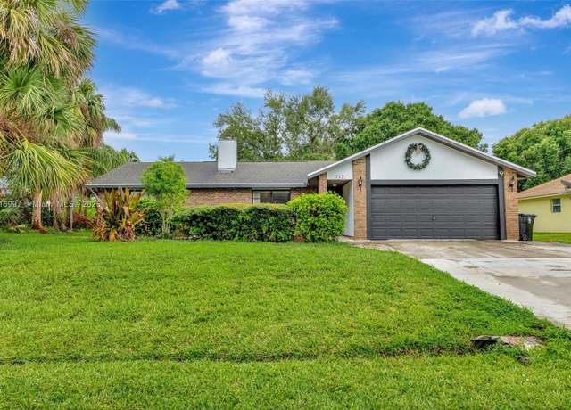 Property at 717 SW Aster Rd, Port St. Lucie, FL 34953, 4 beds, 3 baths
