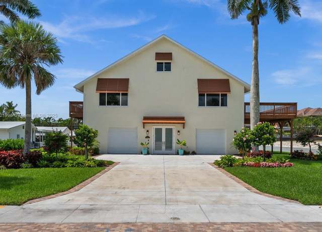 Property at 4837 Tarpon Ave, Cape Coral, FL 34134, 4 beds, 3 baths