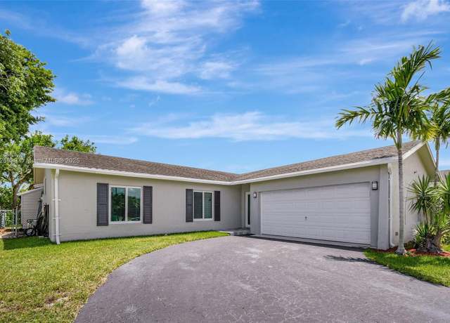 Property at 11120 NW 26th Pl, Sunrise, FL 33322, 4 beds, 2 baths